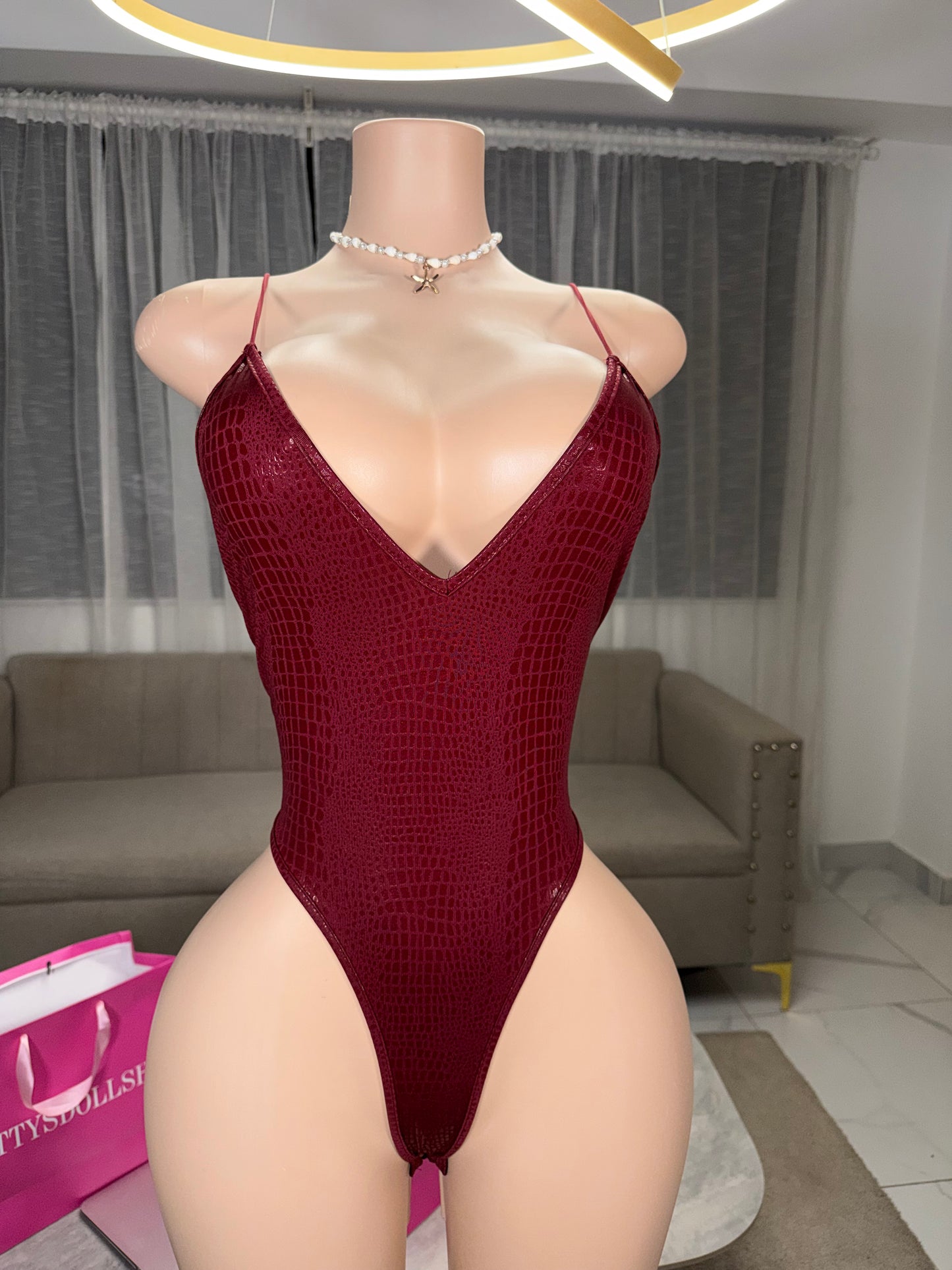 Leather red bodysuit